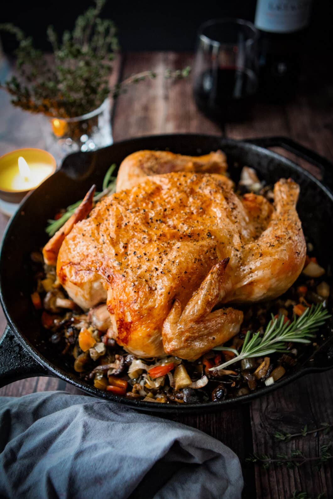 roast chicken and vegetables in skillet