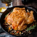 roast chicken and vegetables in skillet