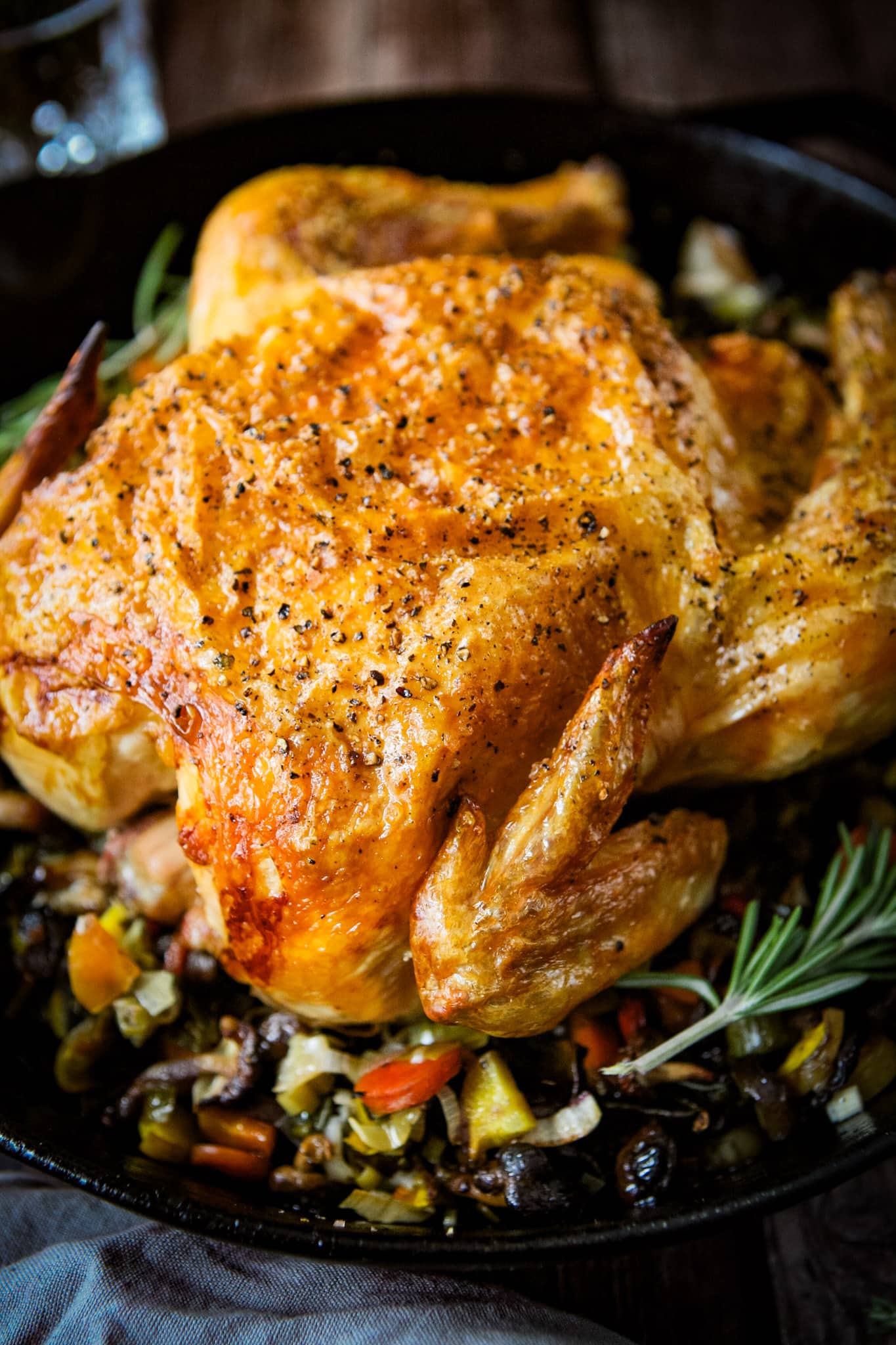 roast chicken and vegetables in skillet