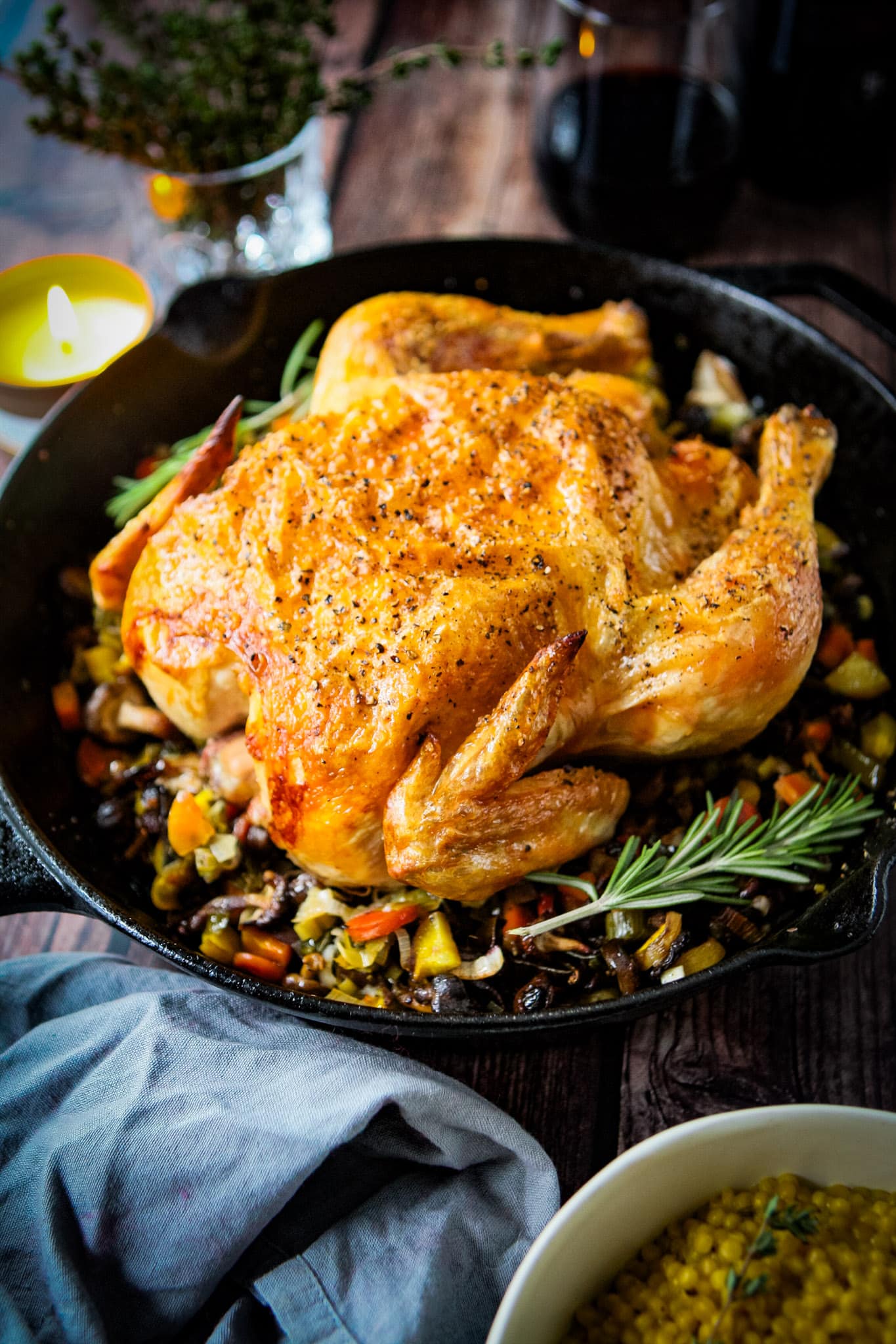 roast chicken and vegetables in skillet